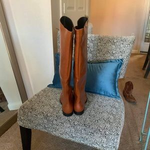 Knee high laced up boots